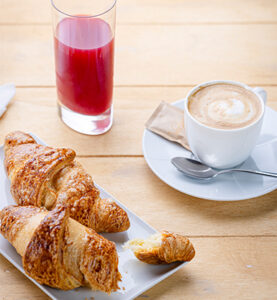 croissant - coffee cup and glass